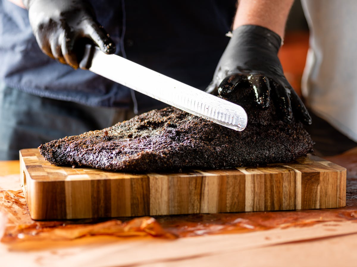 slicing a piece of meat