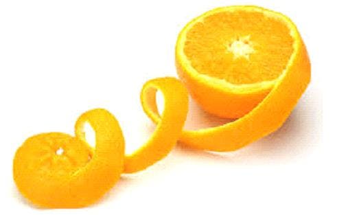 two oranges sitting on a table