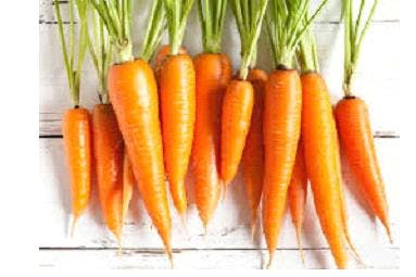 a carrot and a knife on a cutting board