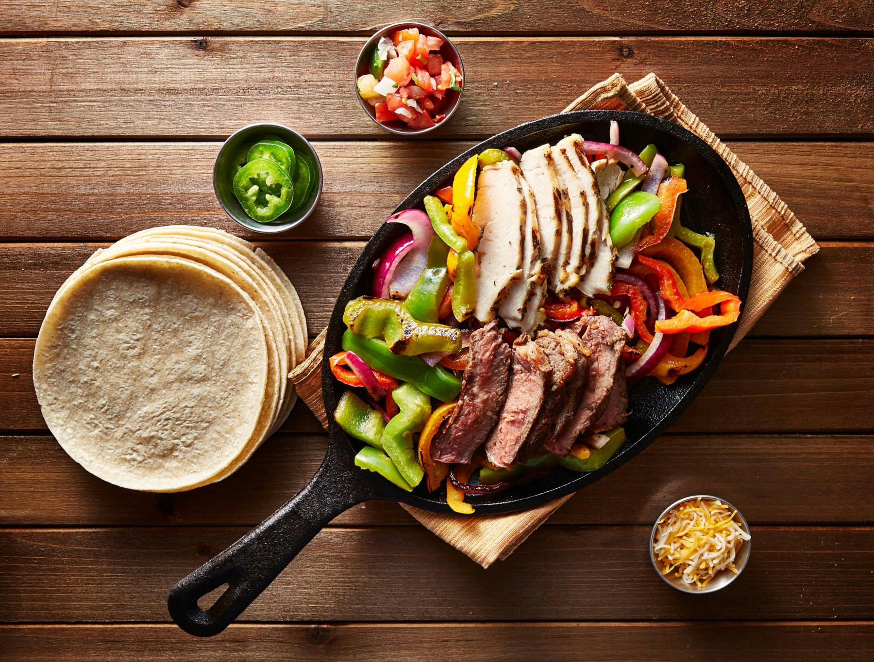 a plate of food on a wooden table
