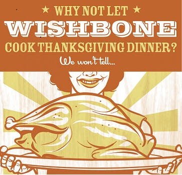 a close up of a person holding a roasted turkey on a platter