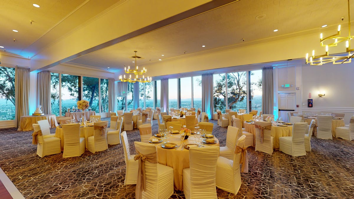 a room filled with furniture and a large window