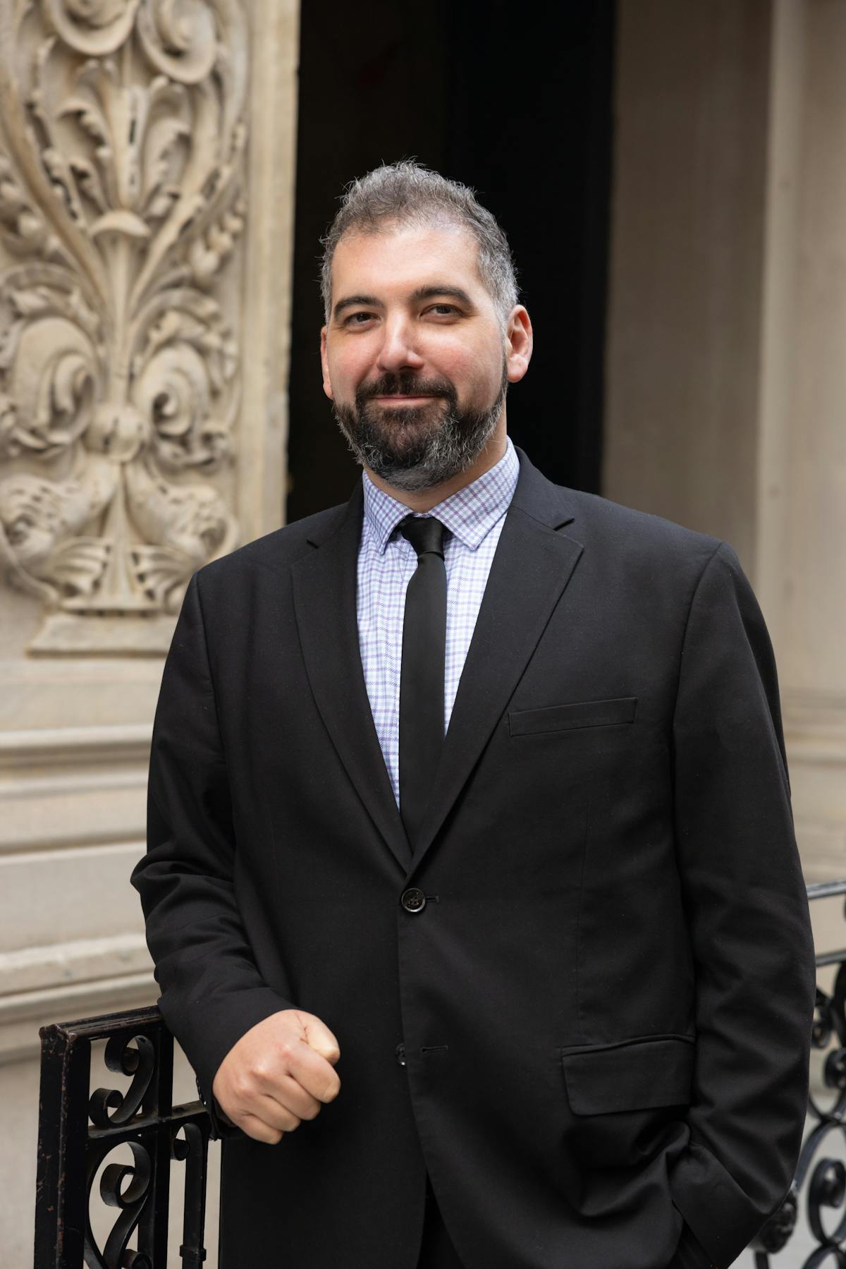 a man wearing a suit and tie