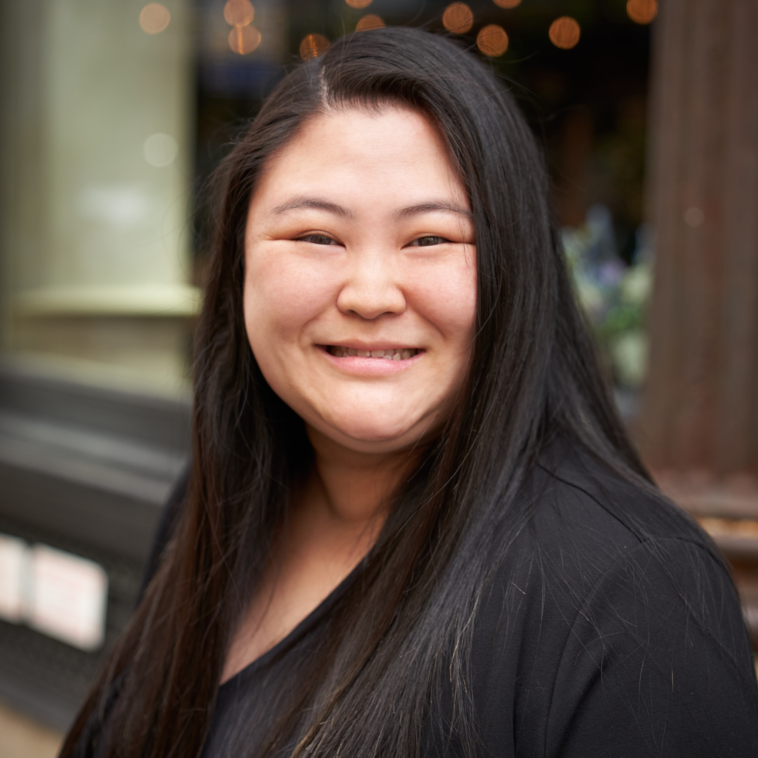 a woman smiling for the camera