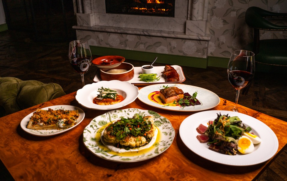 a table topped with plates of food on a plate