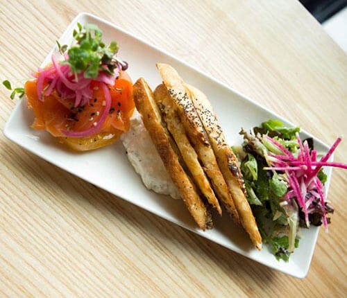 a plate of food on a wooden table