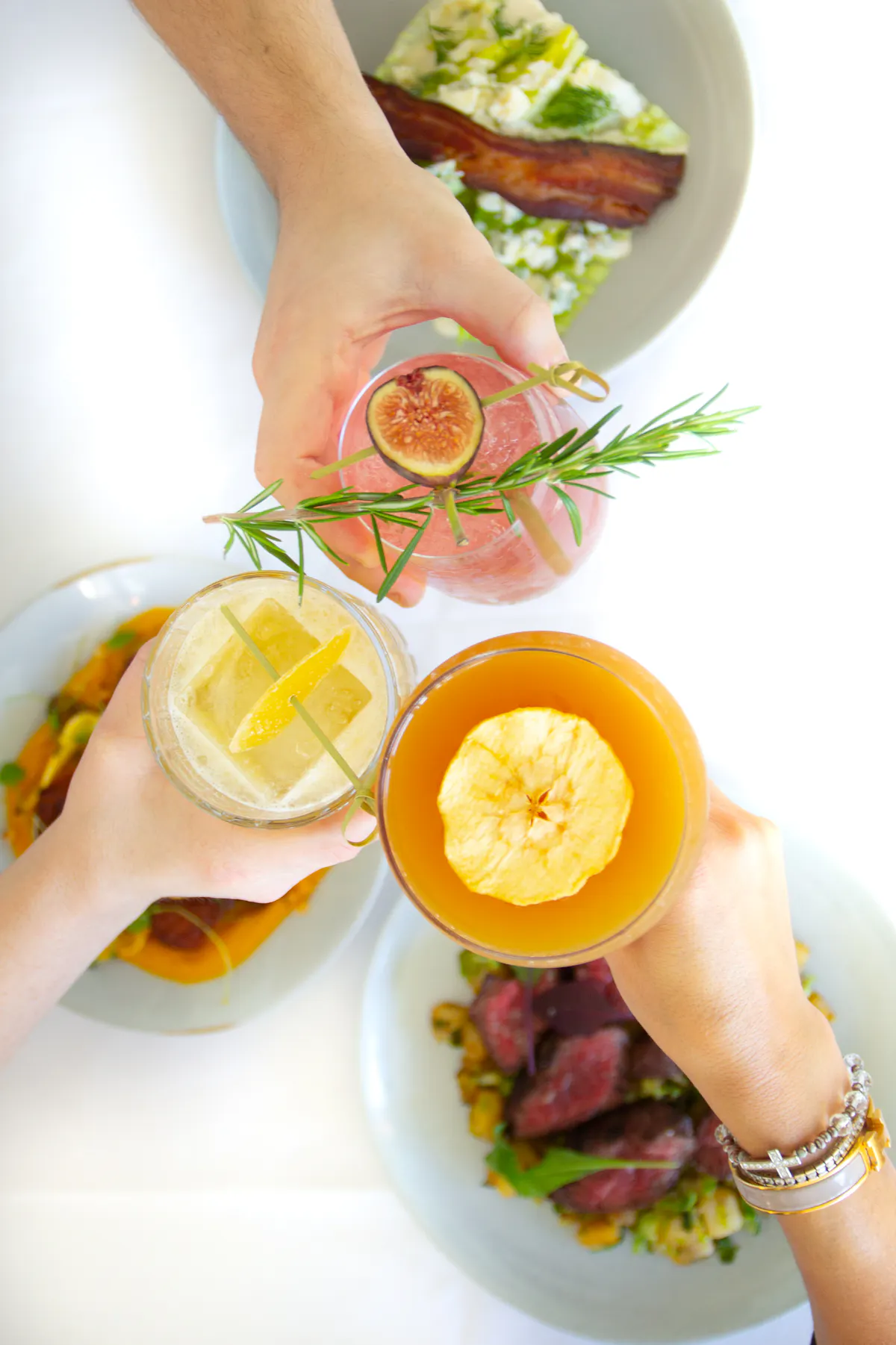 a person holding a plate of food