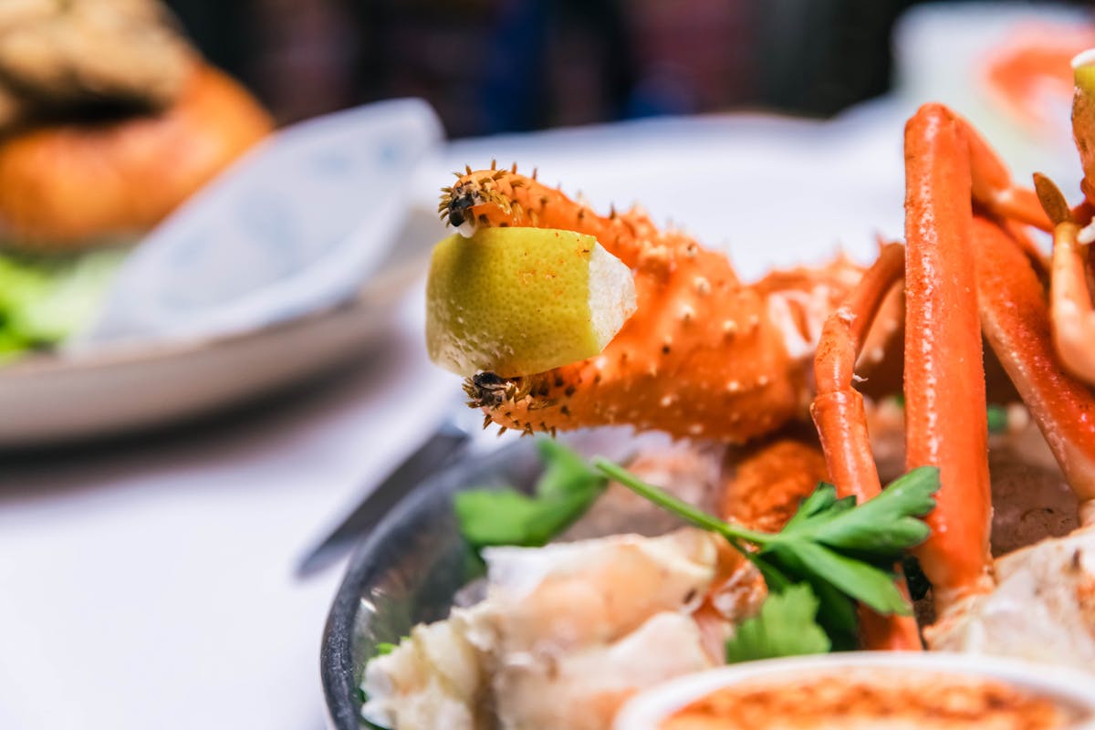 crab with lemon in claw