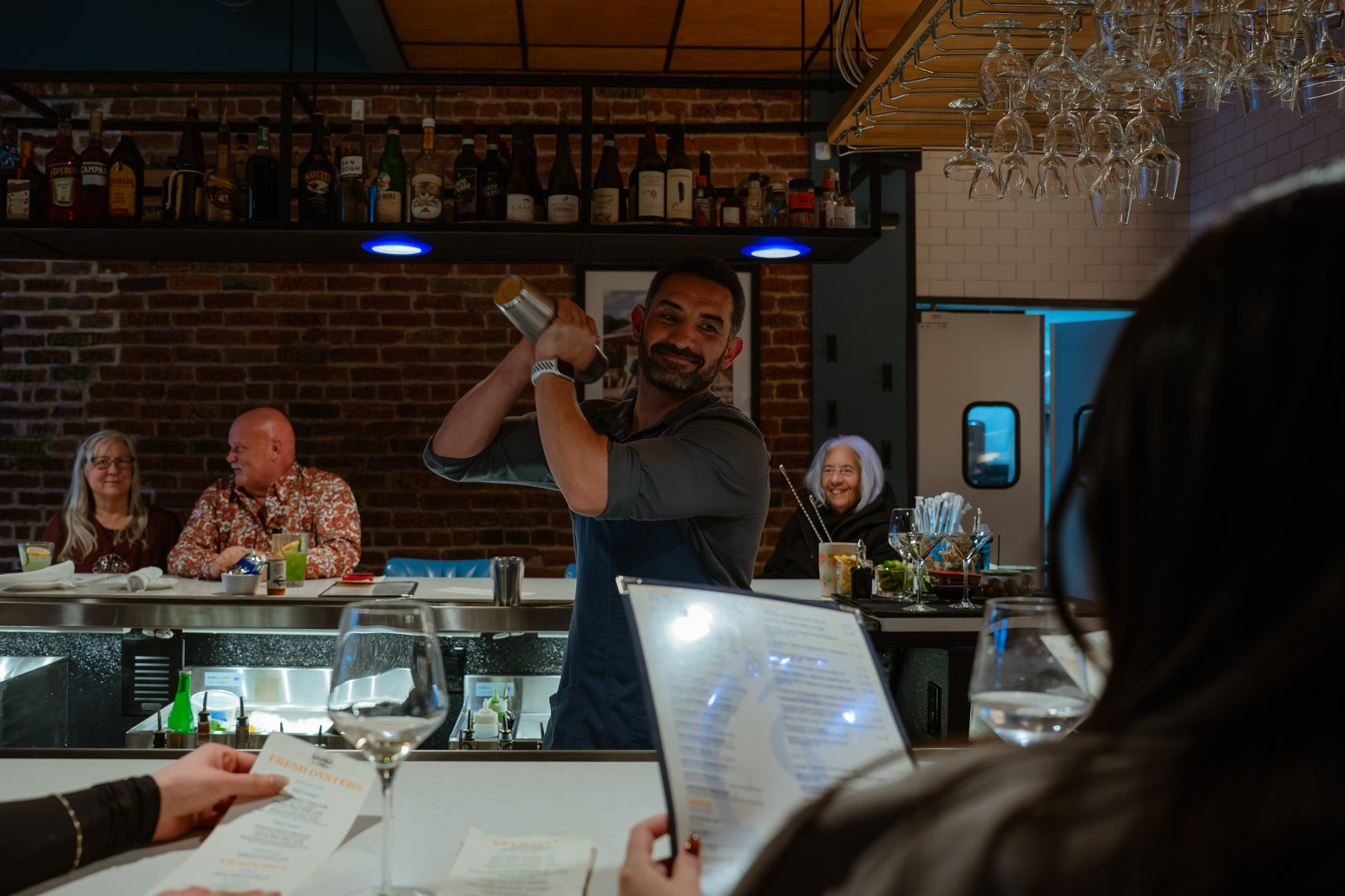 a group of people sitting at a table