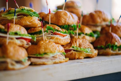 a plate of food with a sandwich and a salad