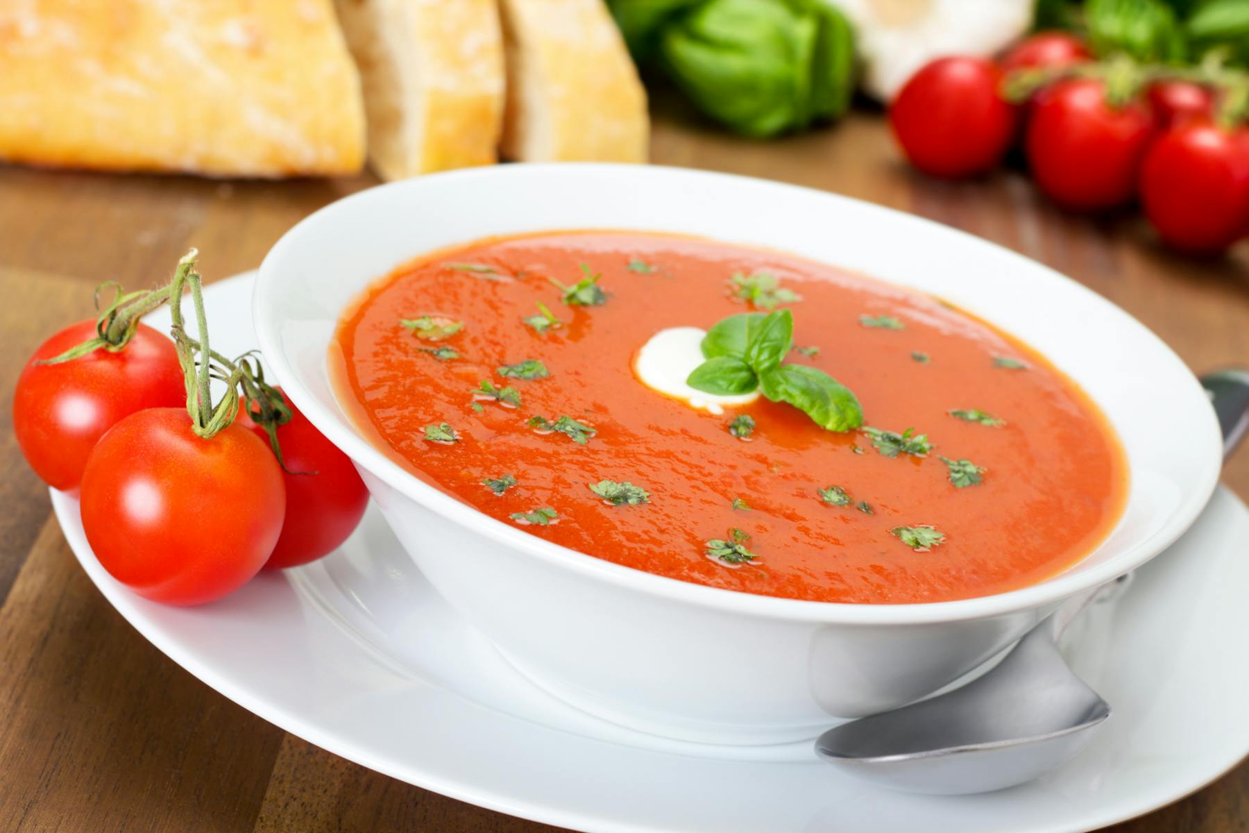 a bowl of food on a plate on a table