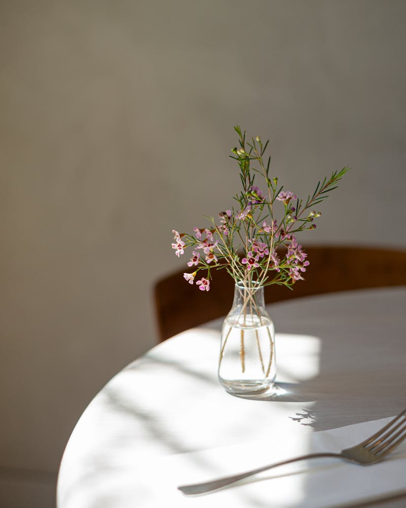 a vase of flowers on a table