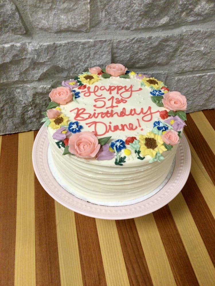 a plate of birthday cake on a table