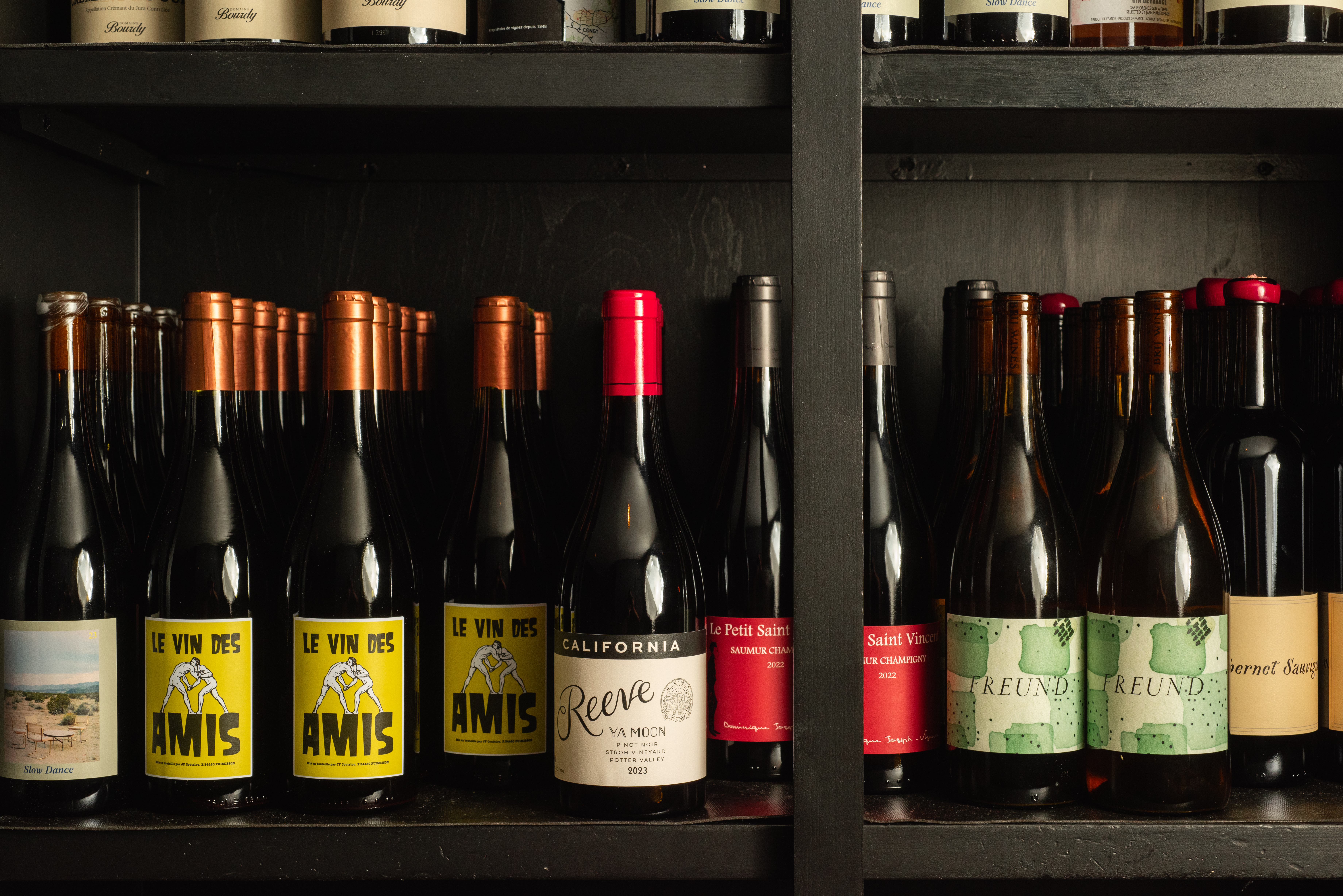 a shelf with bottles