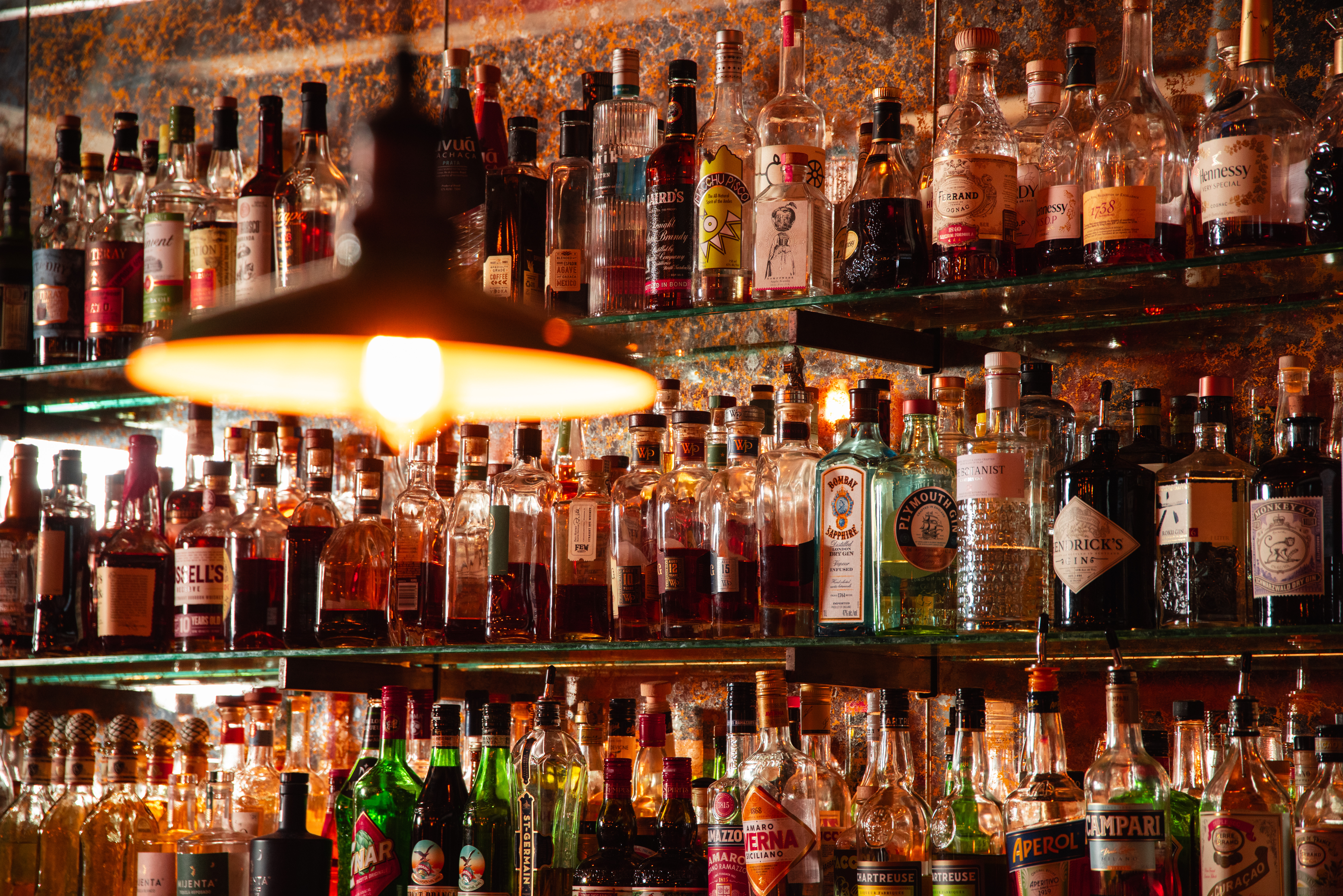 a shelf with bottles