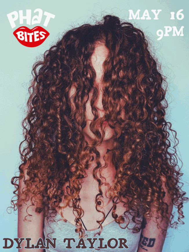 a woman with long curly hair covering her face