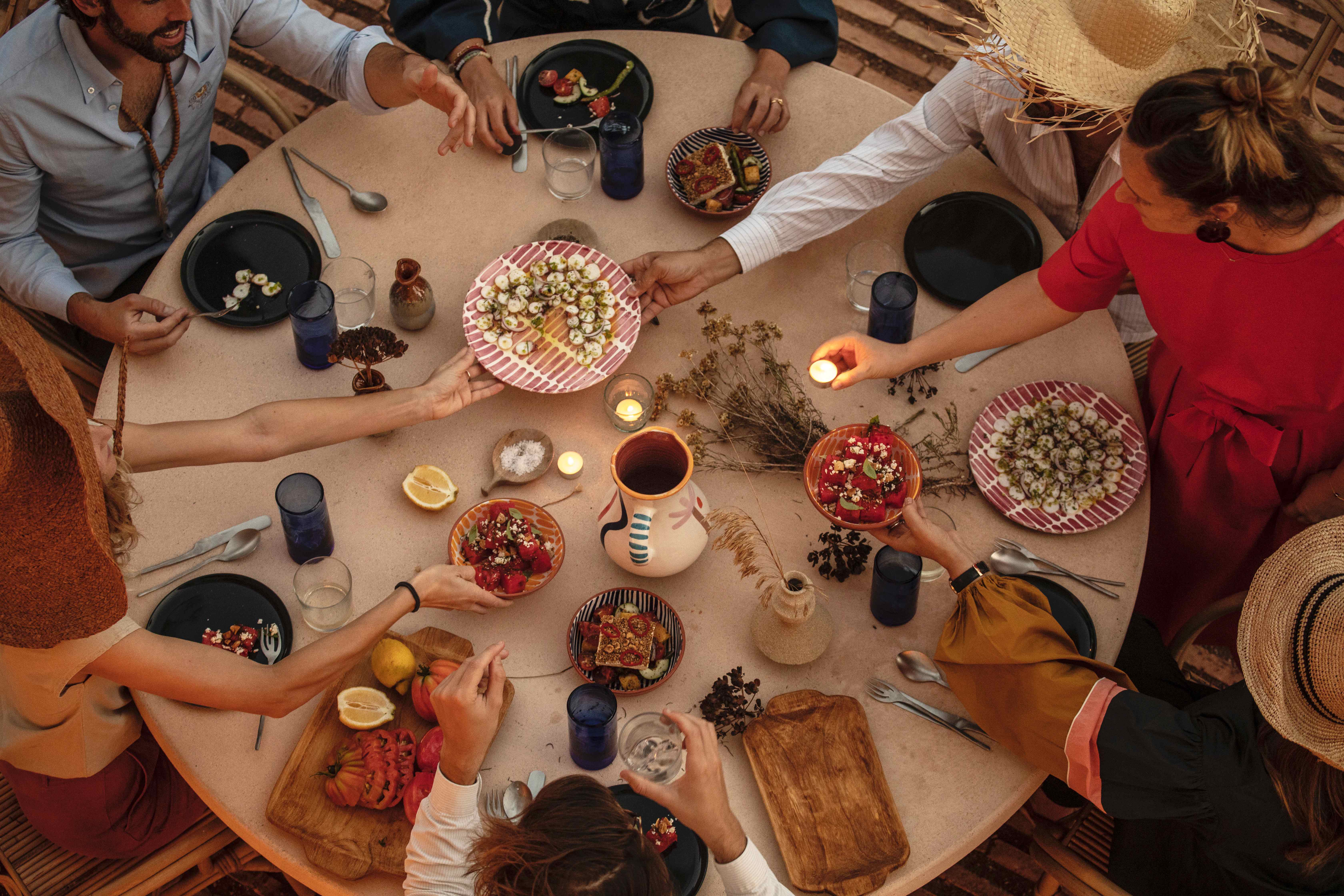 a group of people sitting at a table