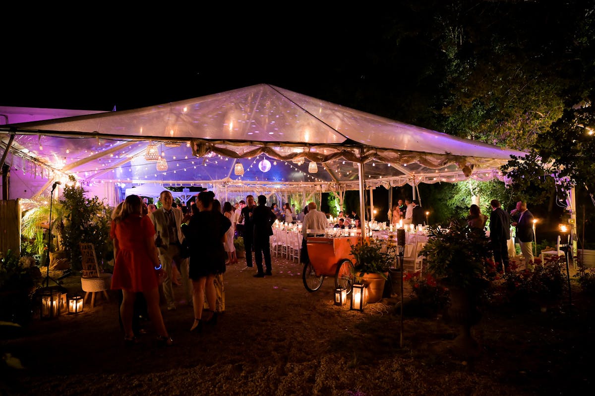 a group of people in a tent