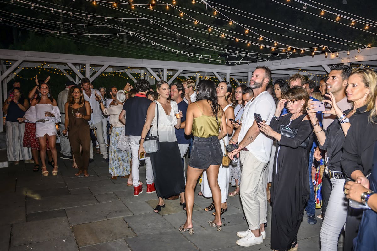 people dancing in a terrace