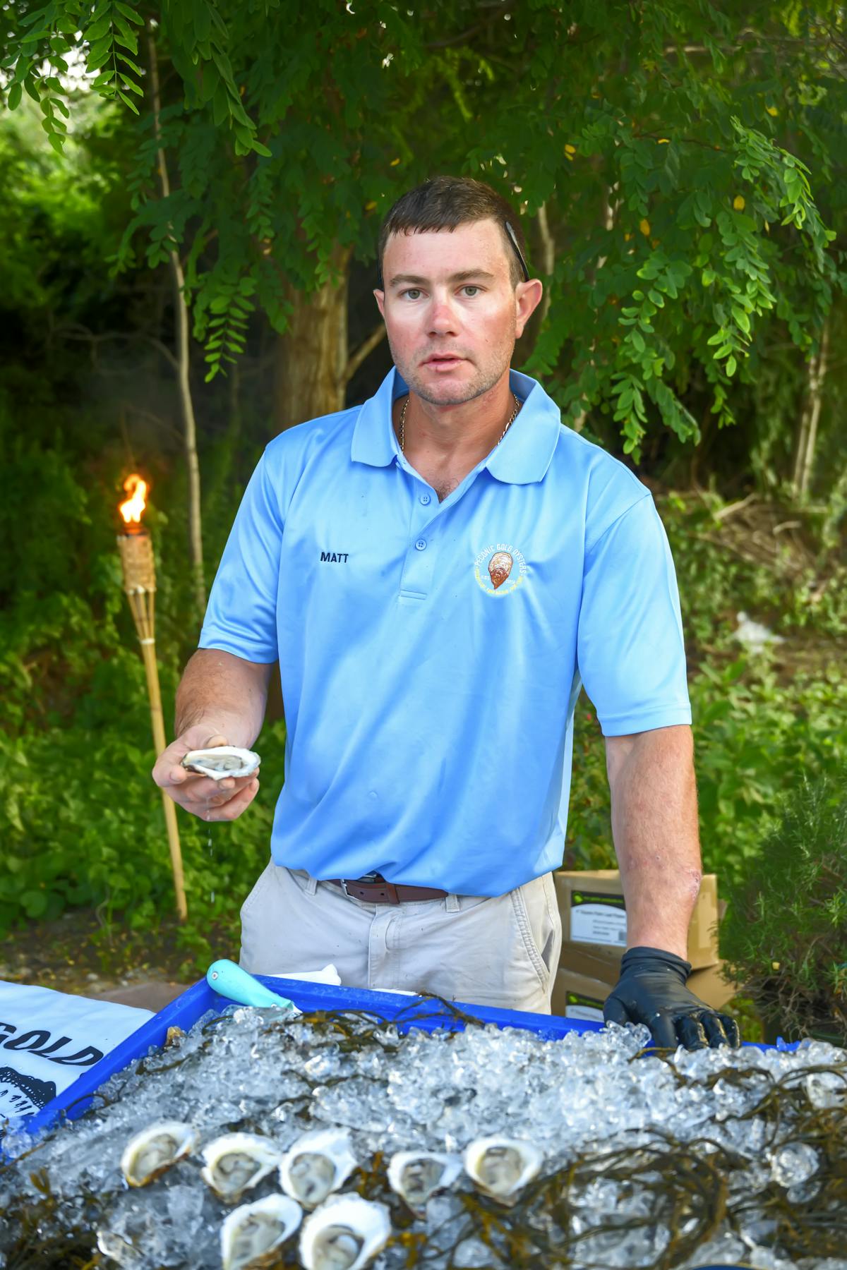 a man in a blue shirt