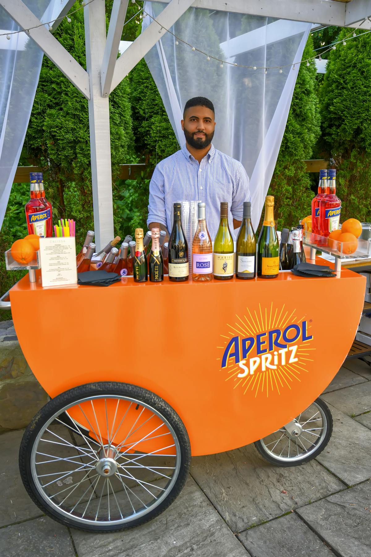 a bartender with a bar cart