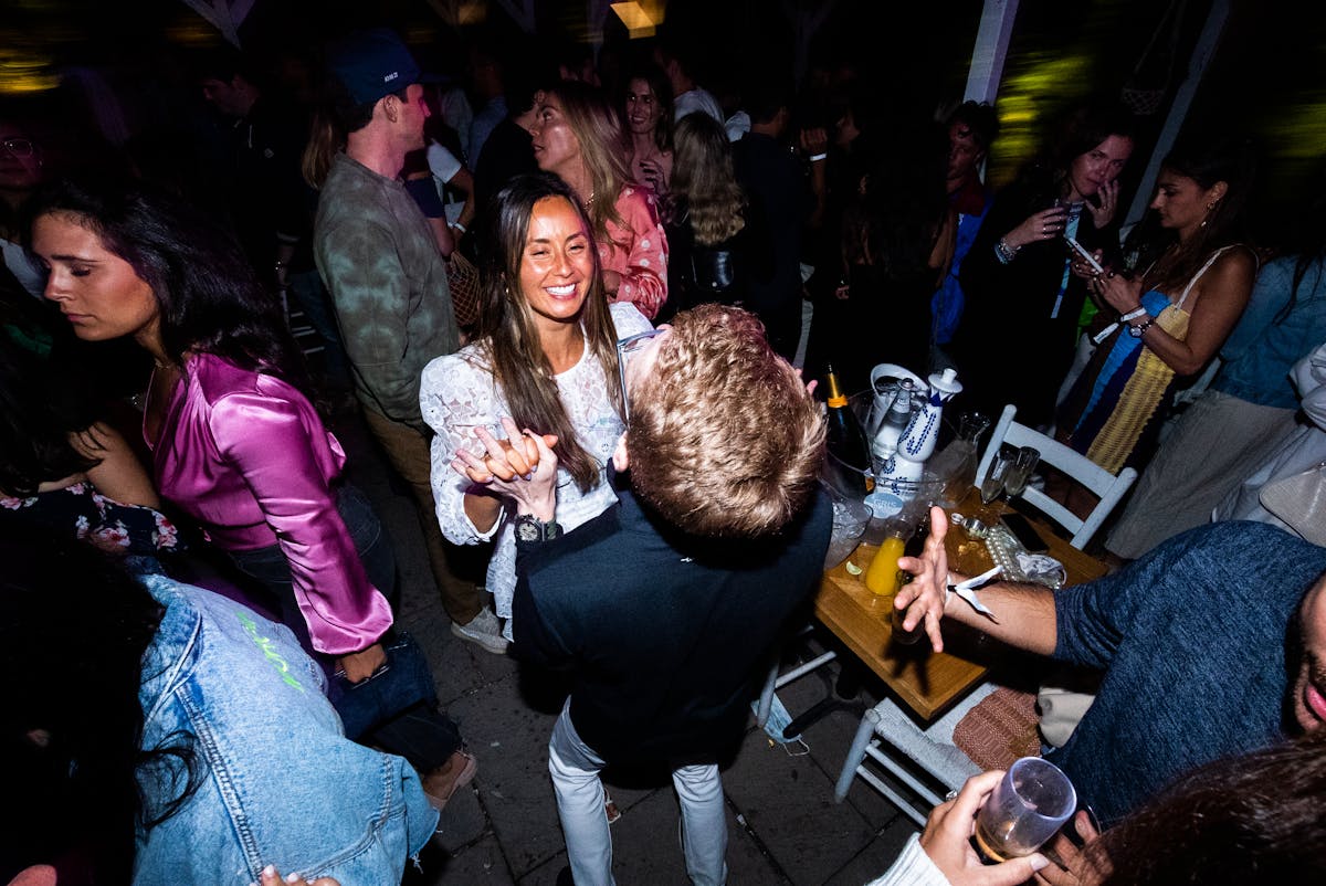 a group of people sitting at a party