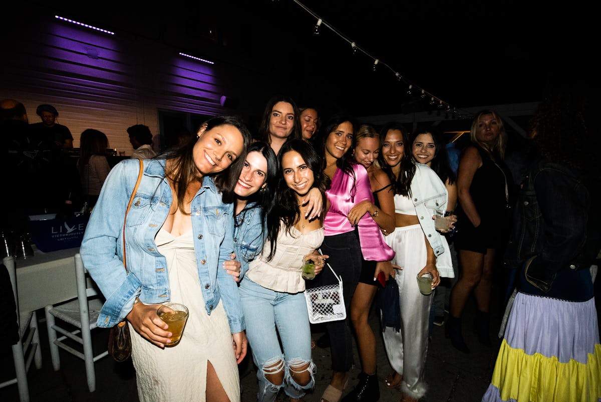 a group of people posing for the camera