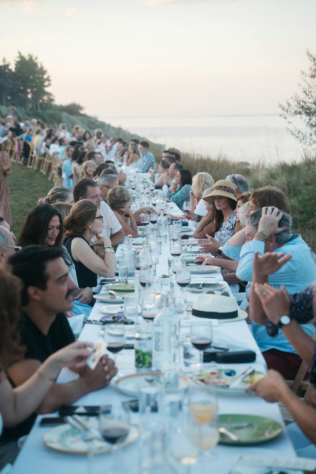 a group of people sitting at a table