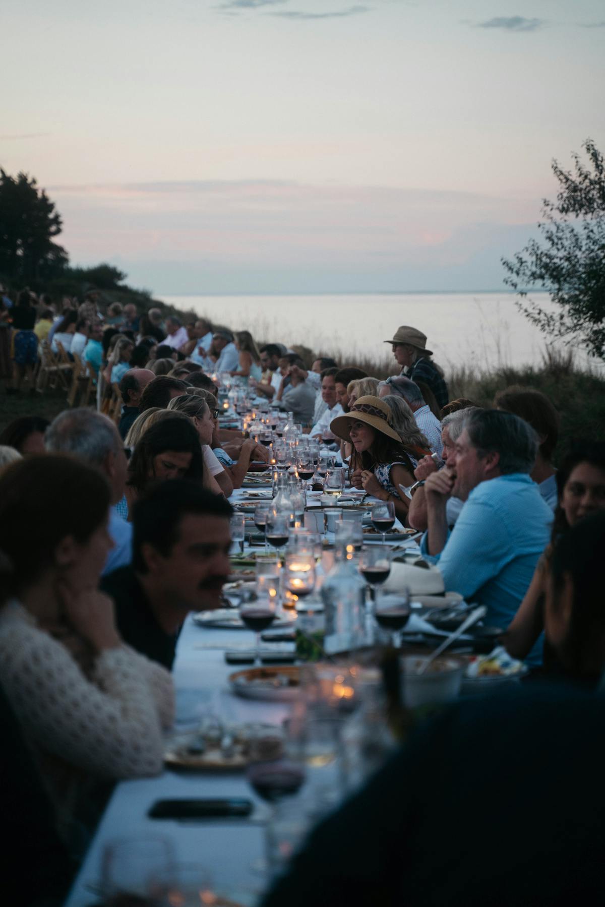 a group of people sitting at a table