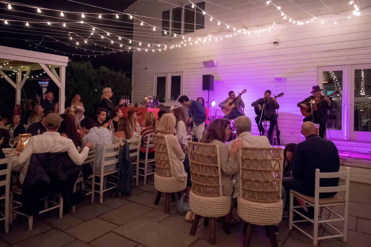 people watching a band playing music