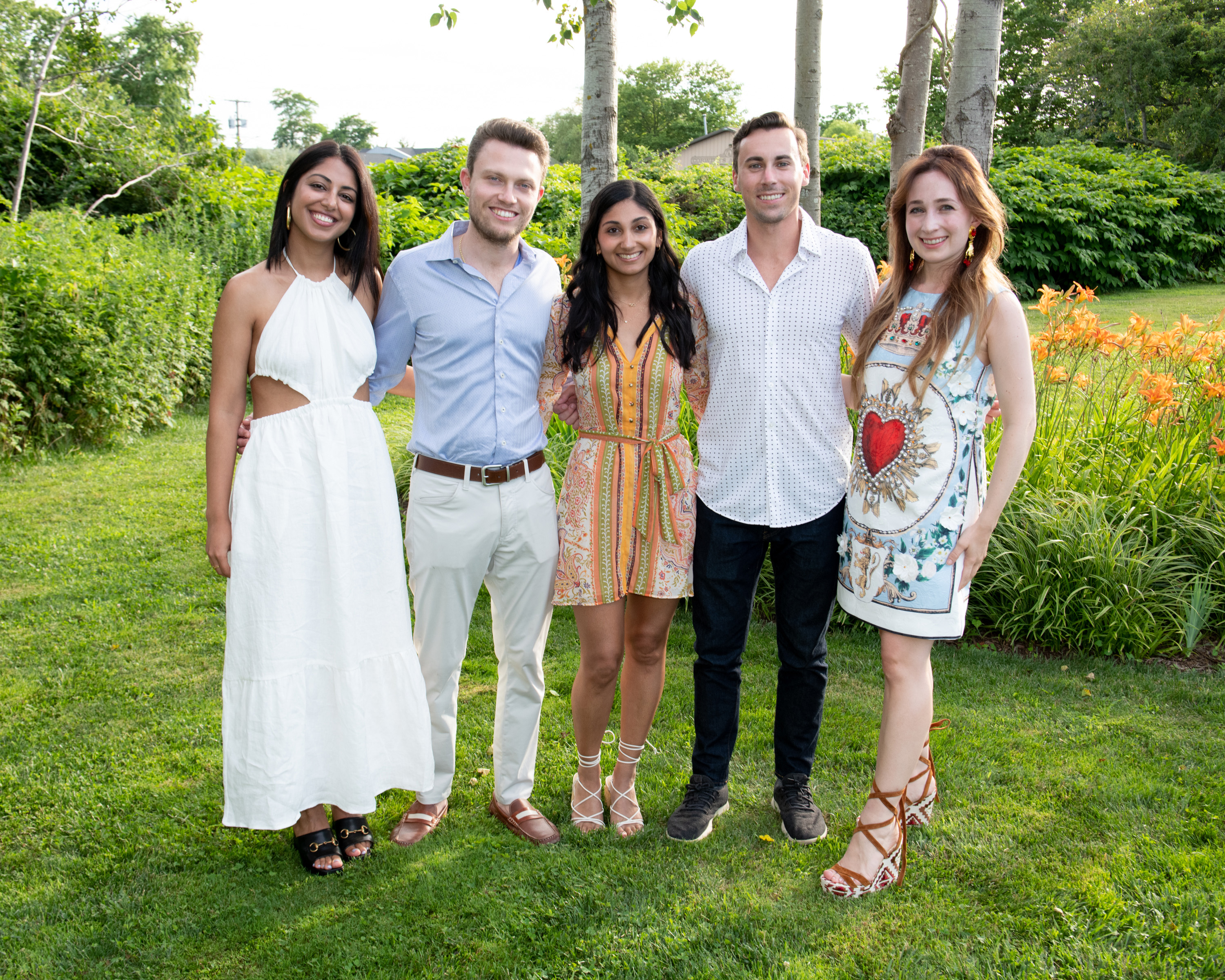 a group of people posing for a photo