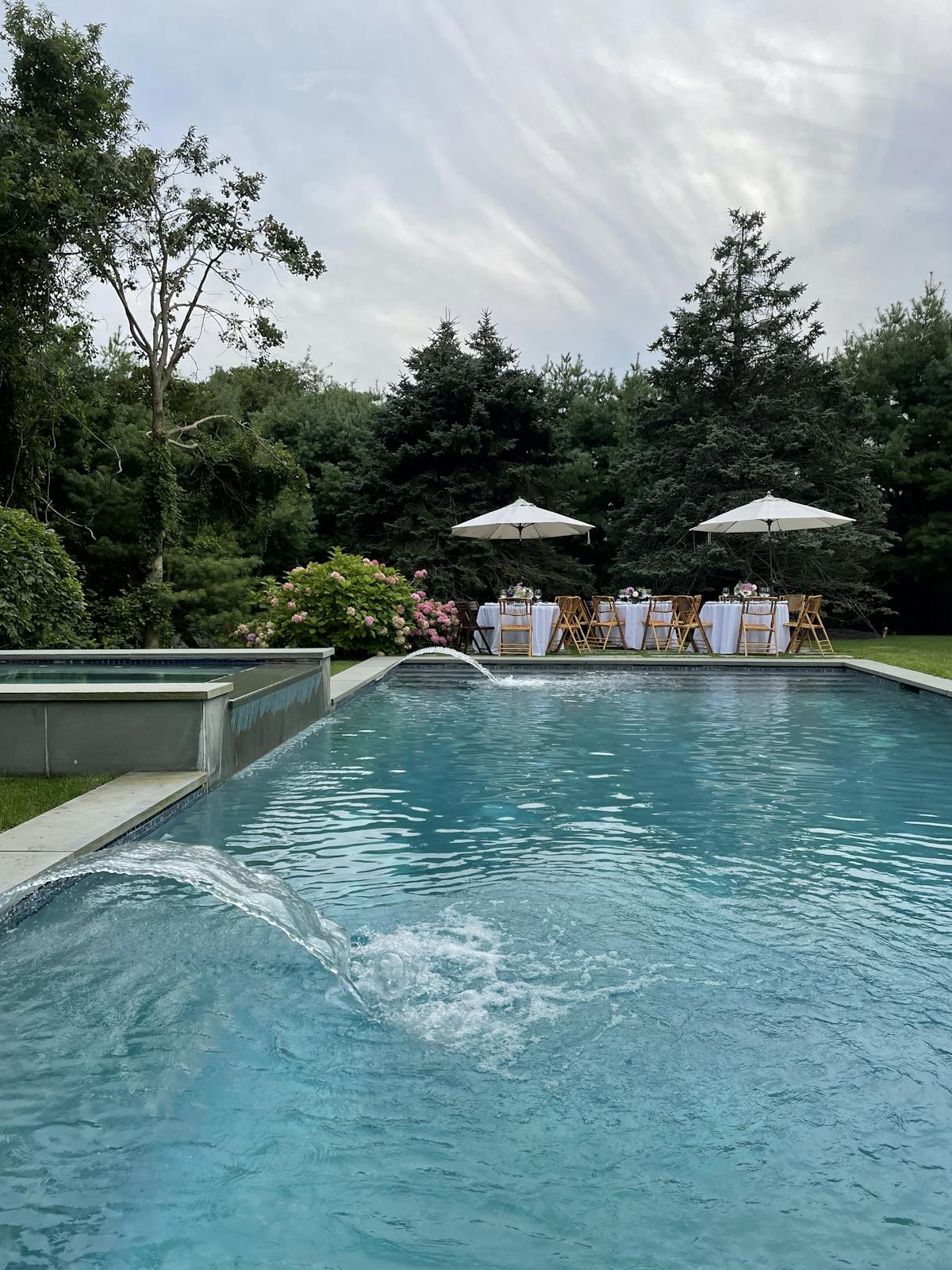 a pool next to a body of water