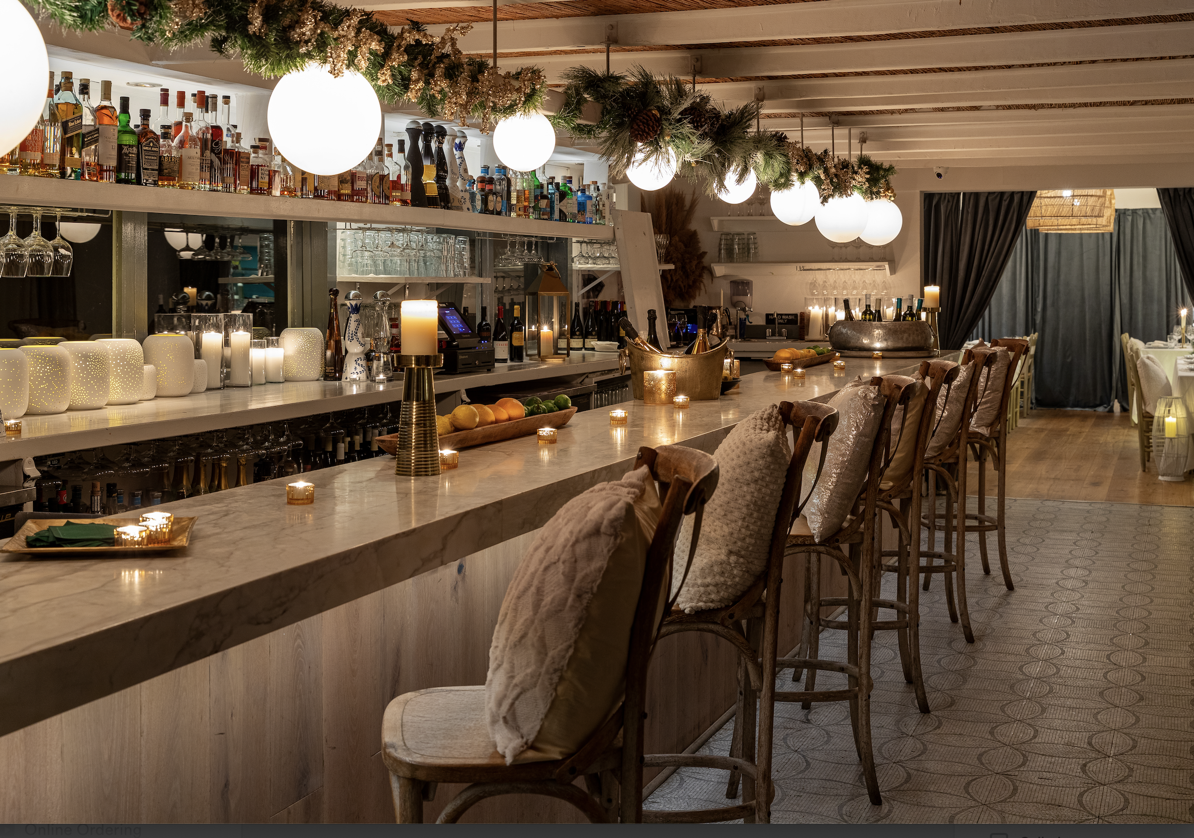 a group of people sitting at a table in a restaurant