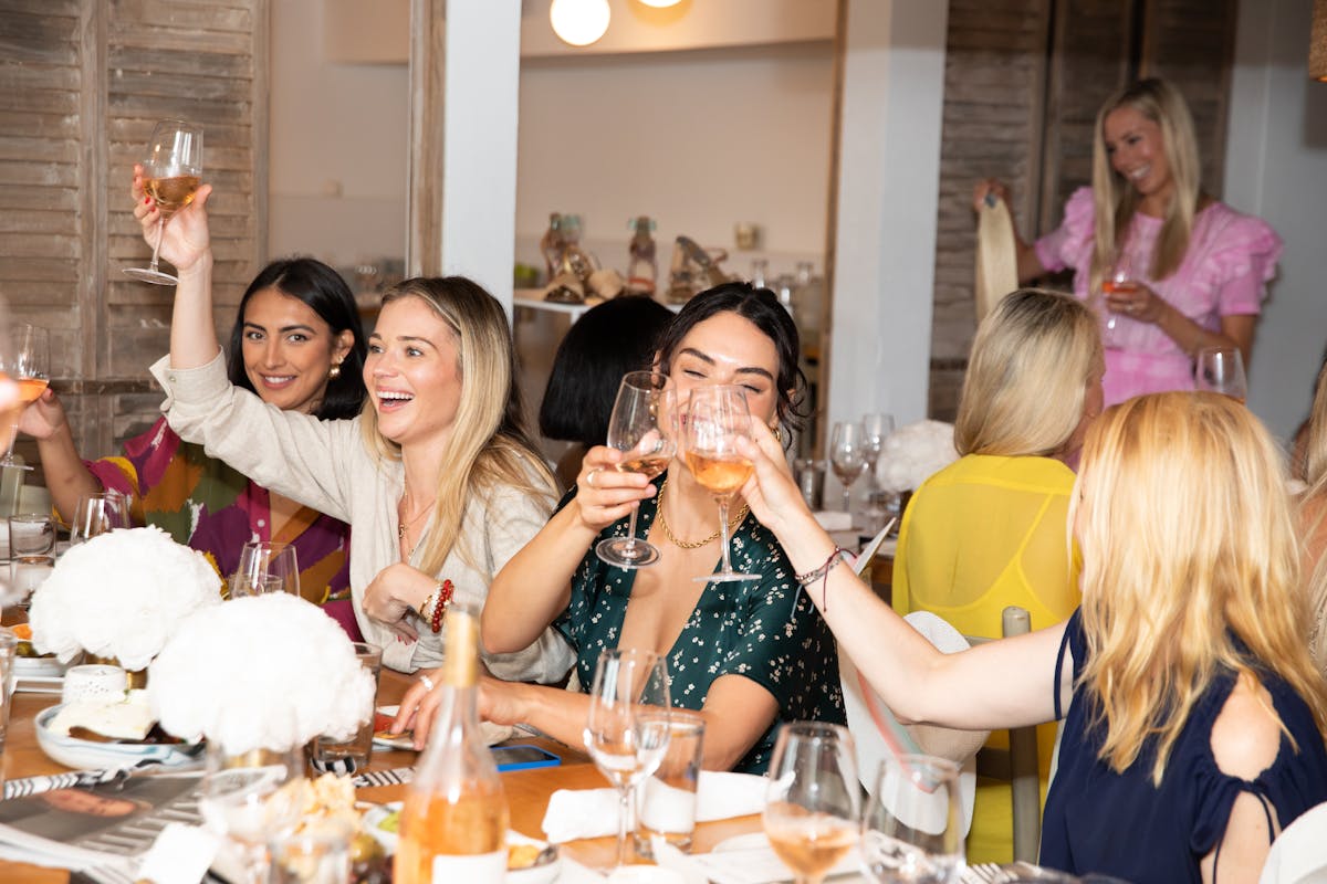 a group of people sitting at a table