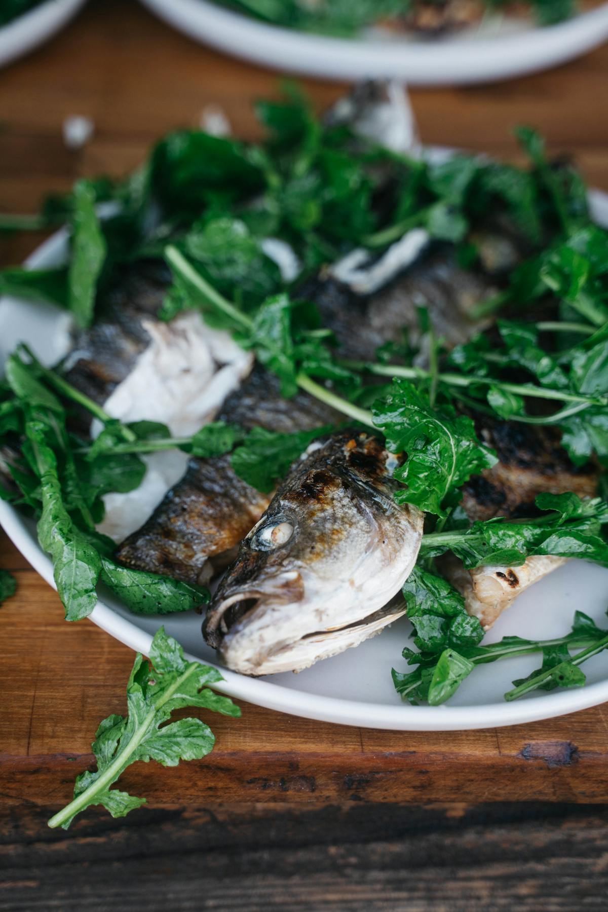 a plate of food on a wooden table