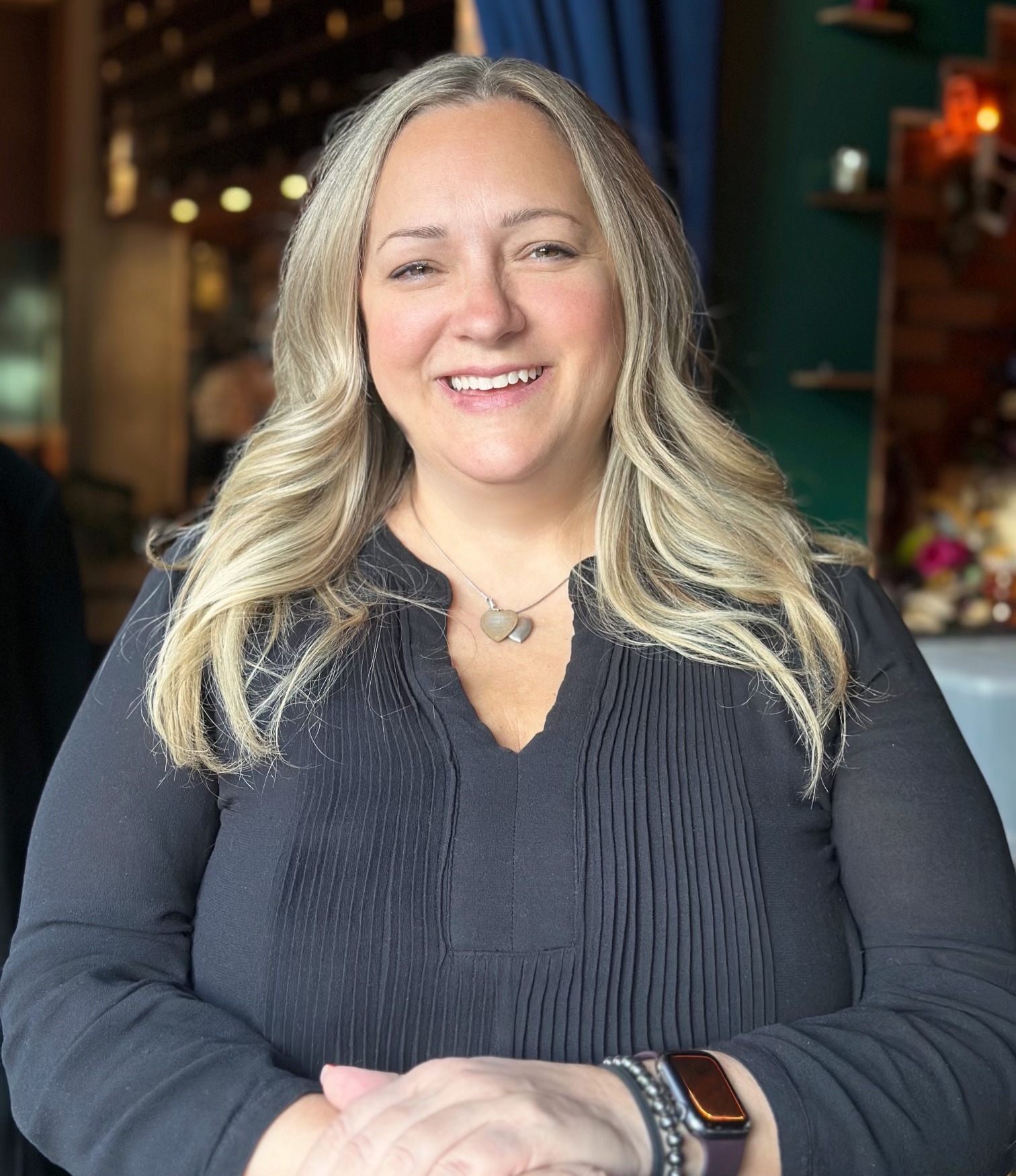 a woman smiling for the camera