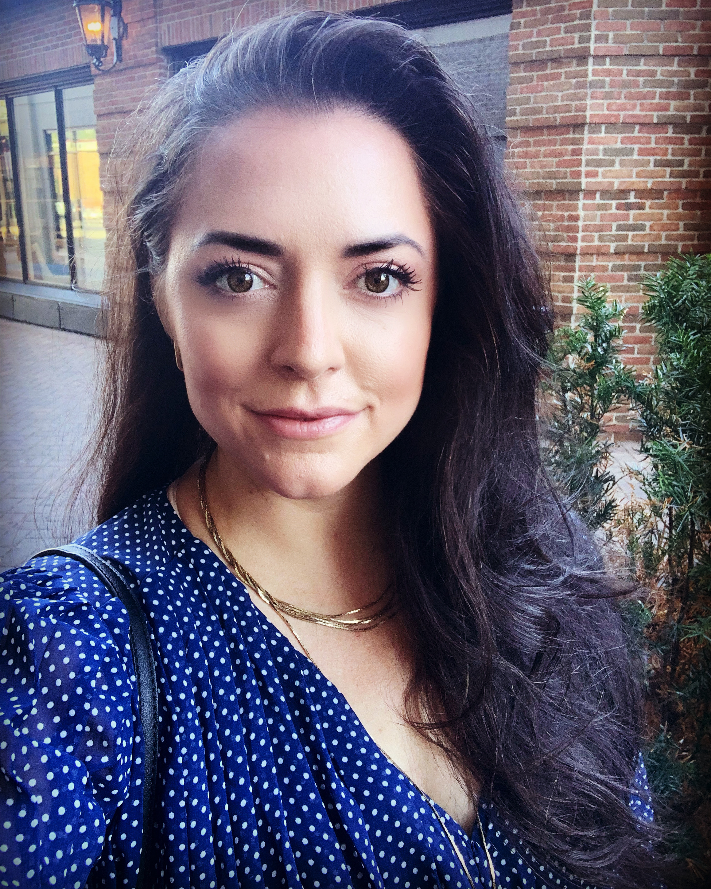 a woman smiling for the camera