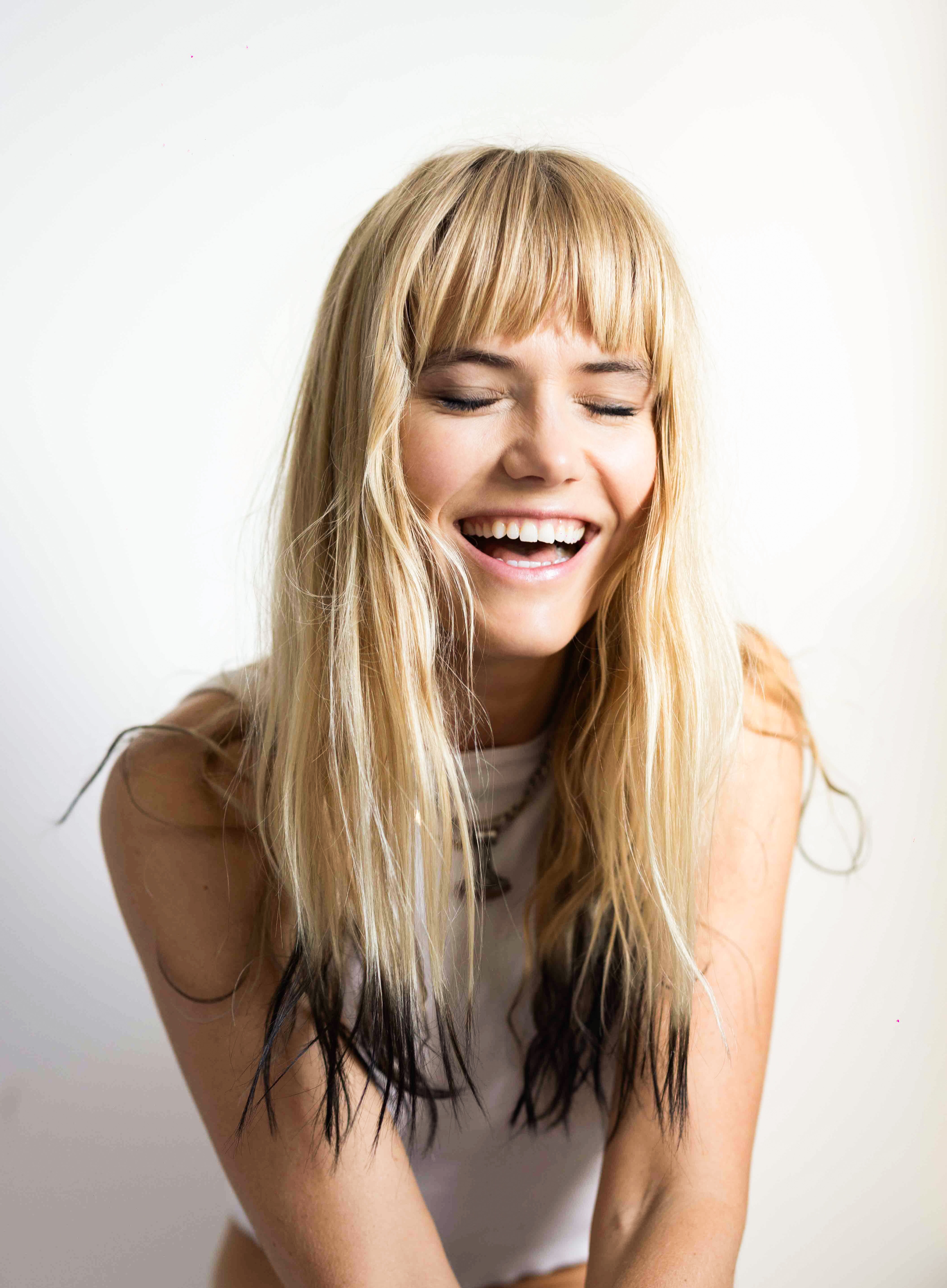 a woman smiling for the camera