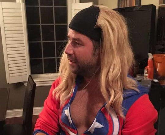 a person wearing a wig