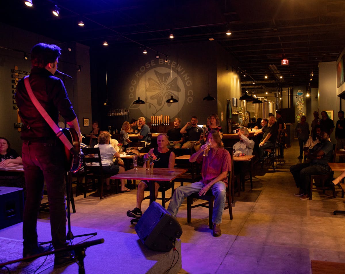 a group of people standing in a room