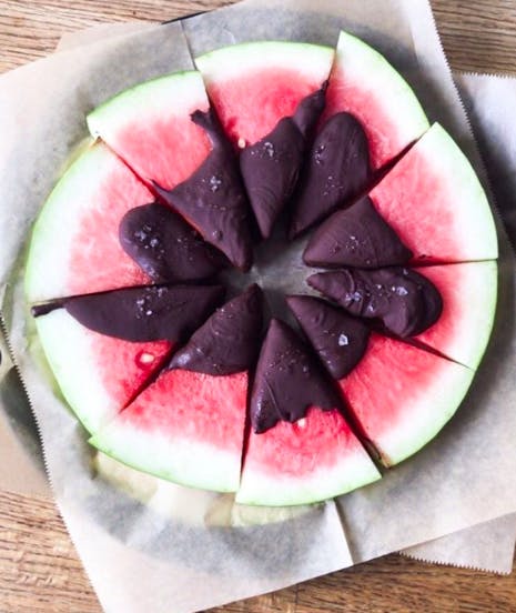 a close up of a sliced apple on a table