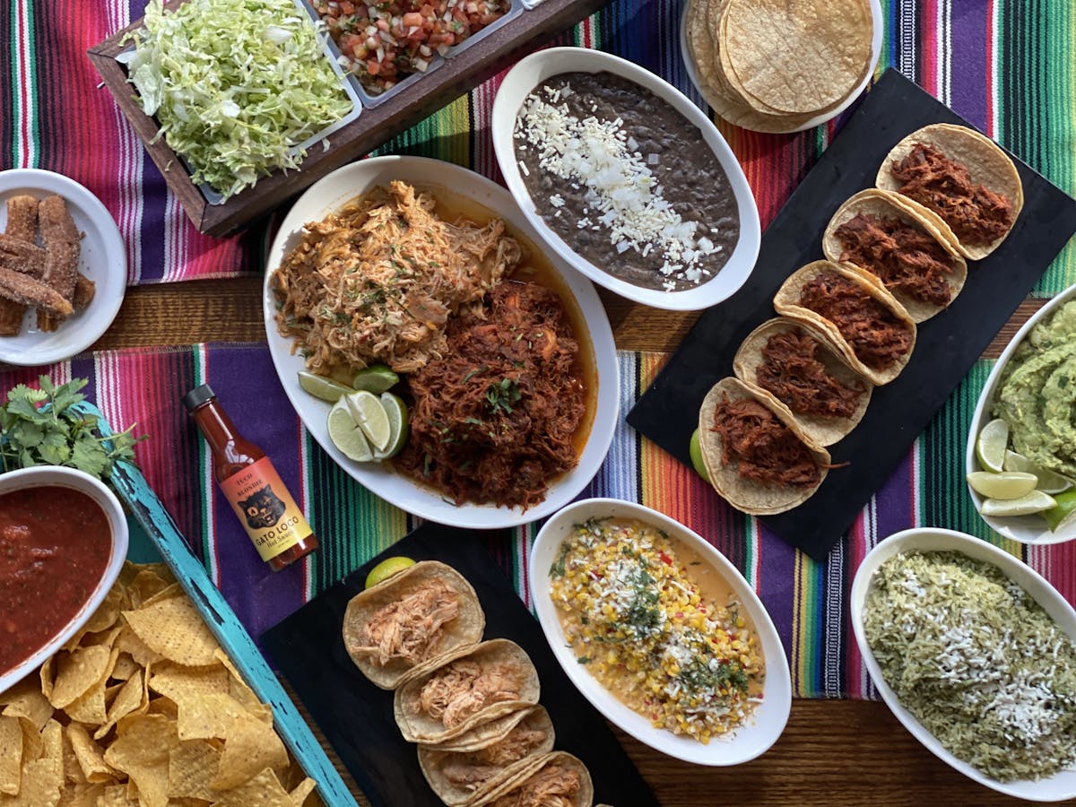 a bowl filled with different types of food on a table