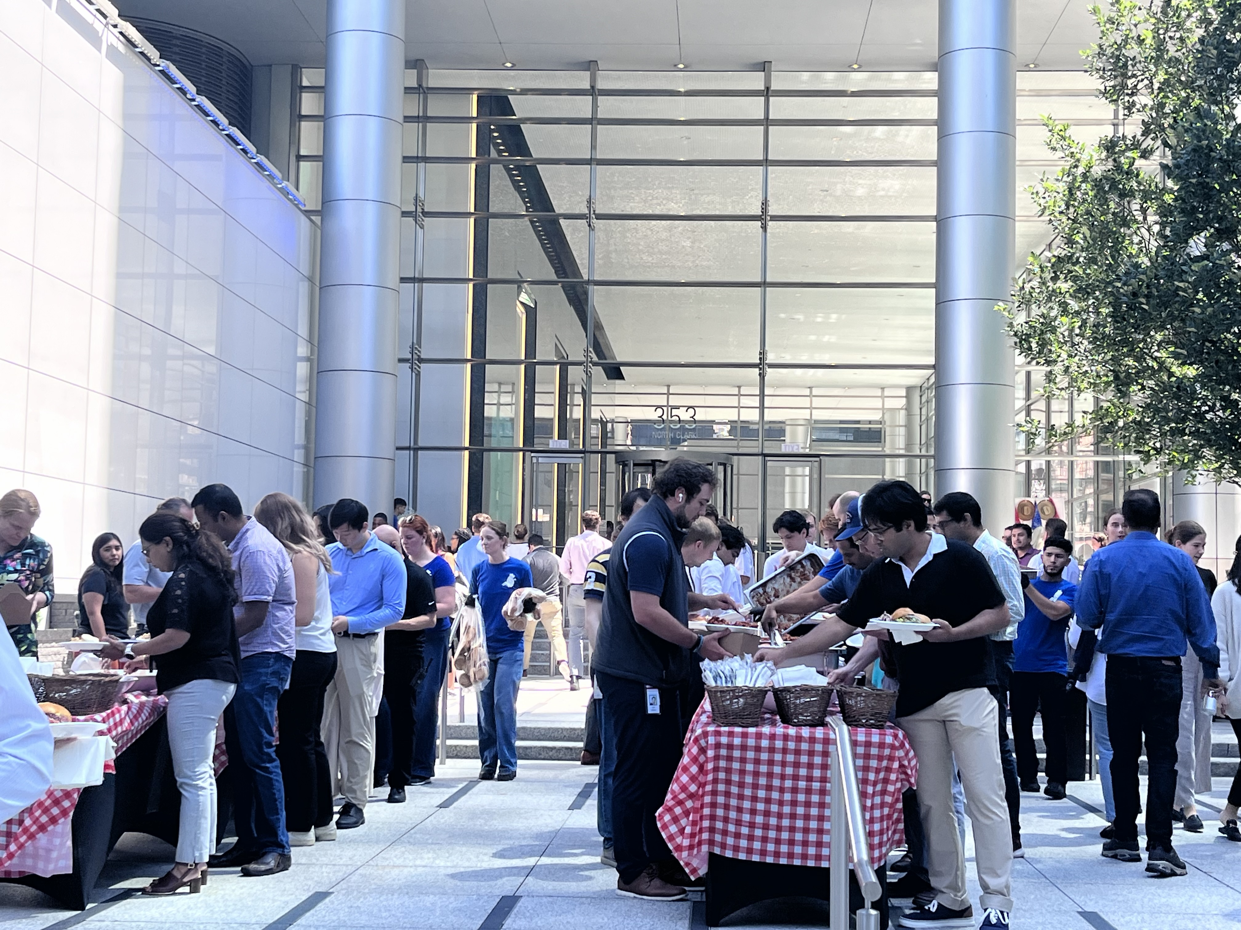 a group of people standing in front of a building