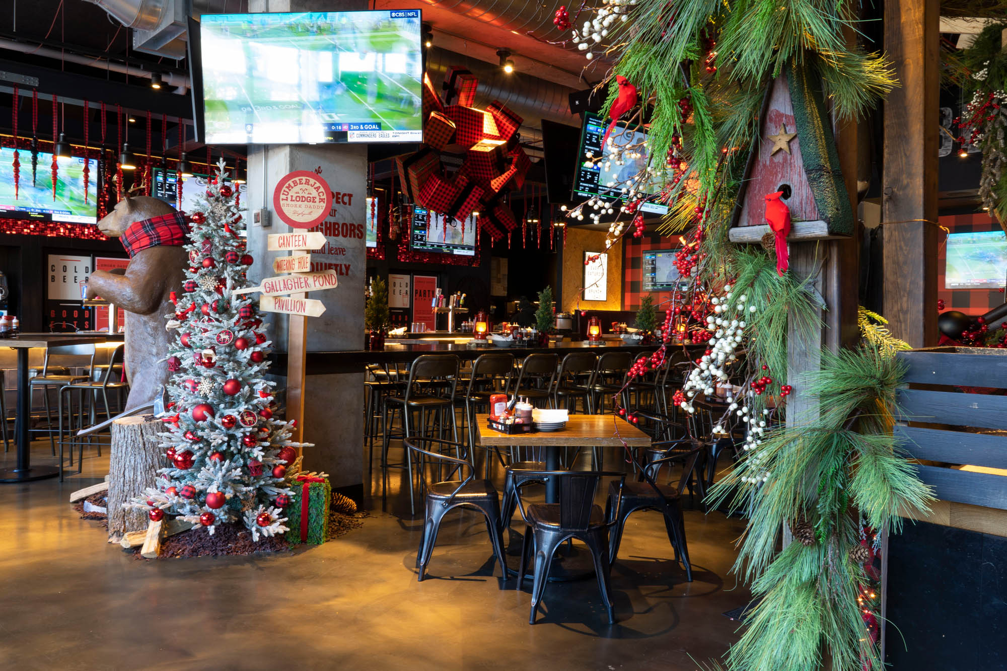 a group of people walking in front of a store
