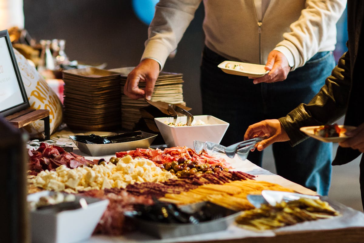 a person cutting food on a table