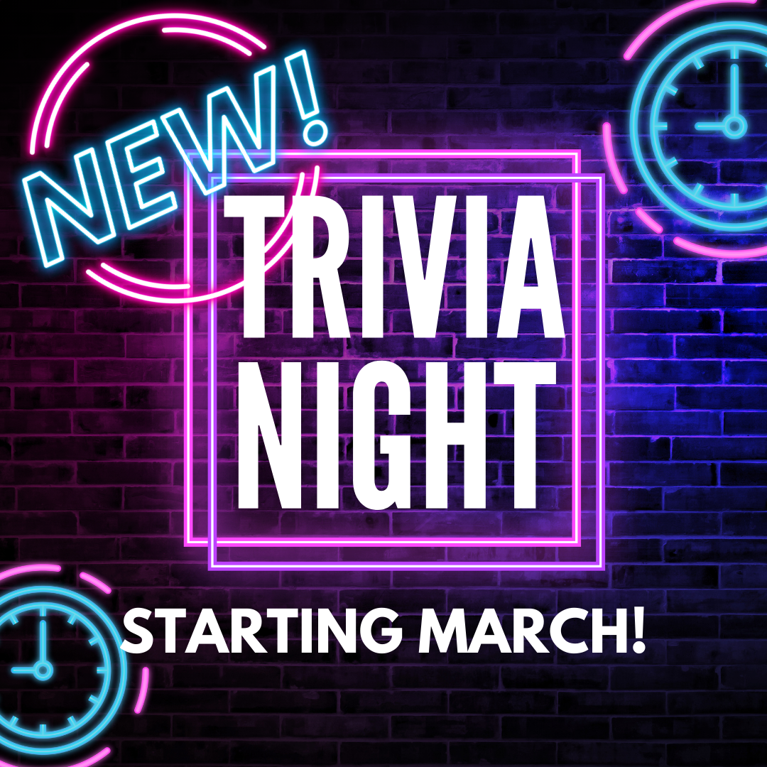 a sign on a brick wall