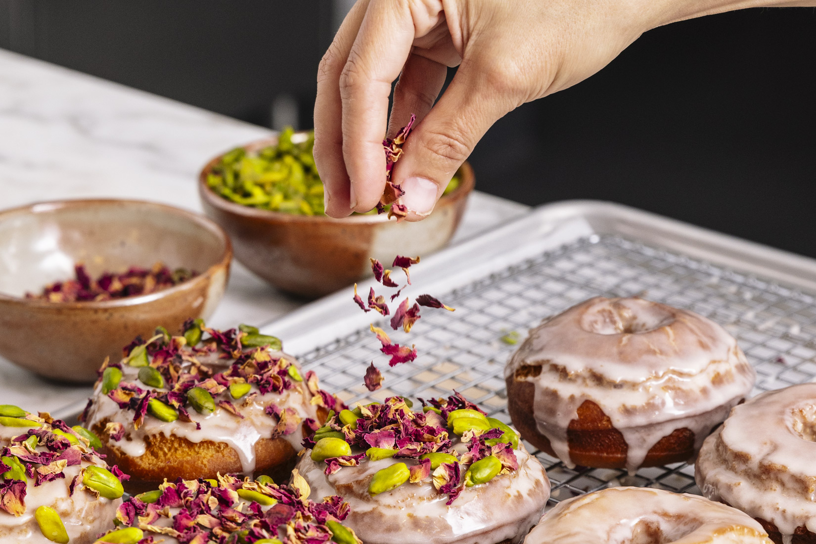 a plate of food that is on a cutting board with a cake