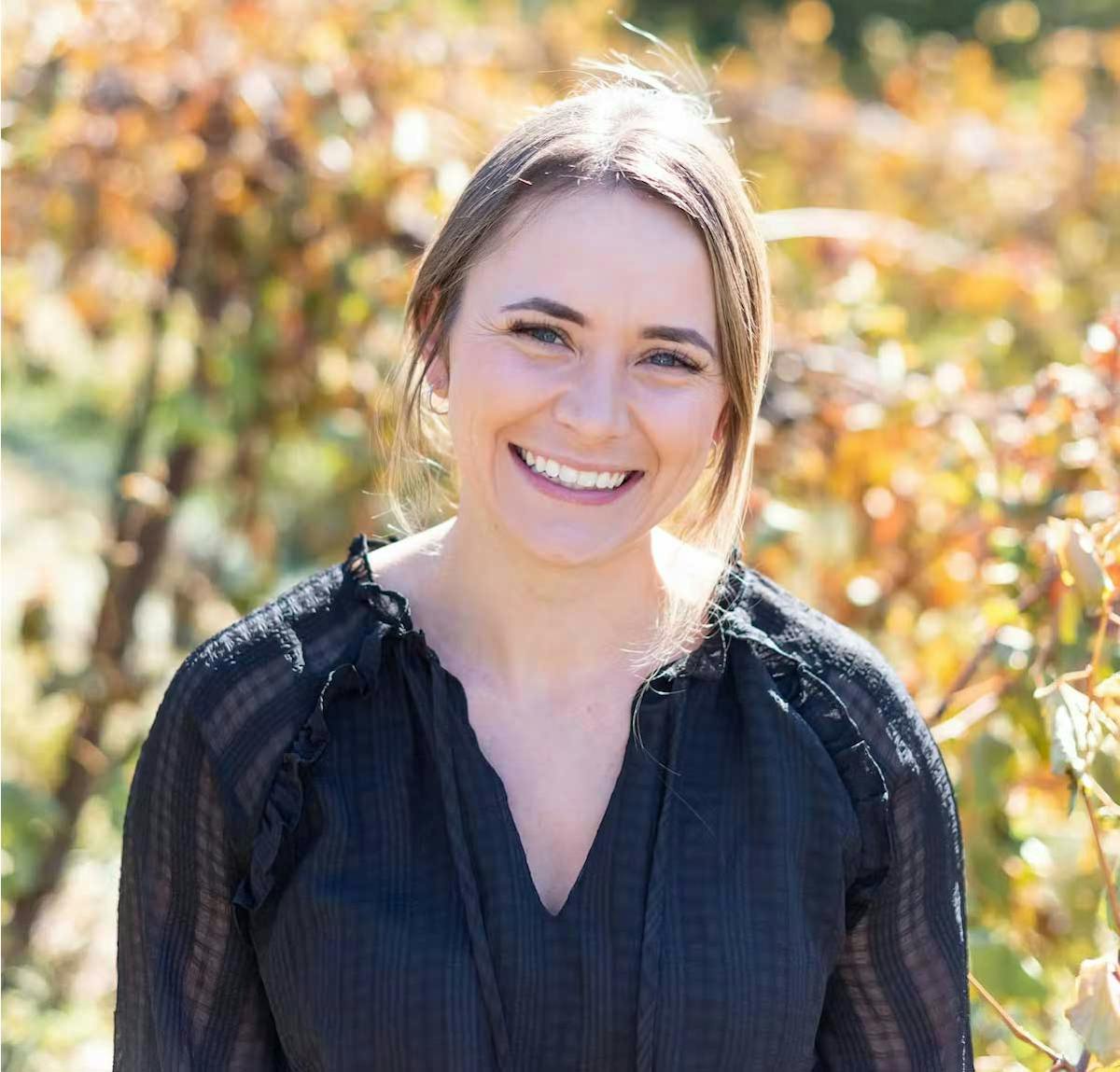 a person smiling for the camera