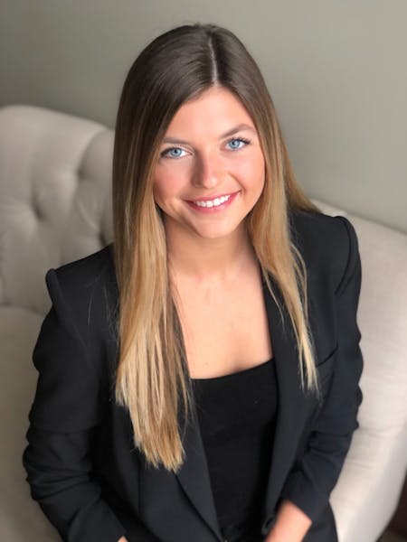 a woman smiling for the camera