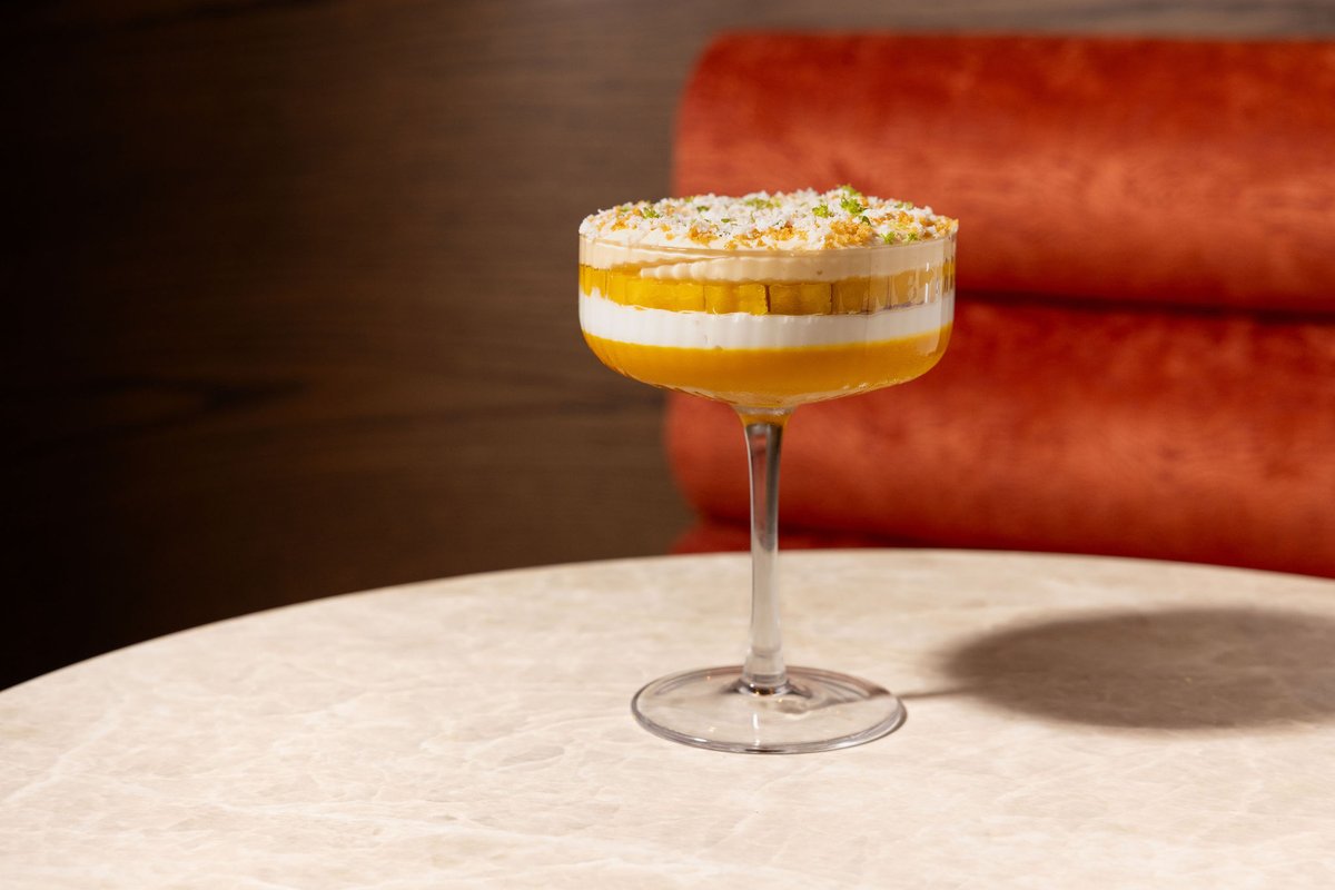 Banana custard dessert layered with whipped cream at Markette Restaurant, Chelsea NYC near Madison Square Garden and Hudson Yards.